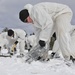 Cold-Weather Operations Course Class 18-06 students build Arctic tents during training at Fort McCoy