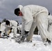 Cold-Weather Operations Course Class 18-06 students build Arctic tents during training at Fort McCoy