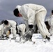 Cold-Weather Operations Course Class 18-04 students build Arctic tents during training at Fort McCoy