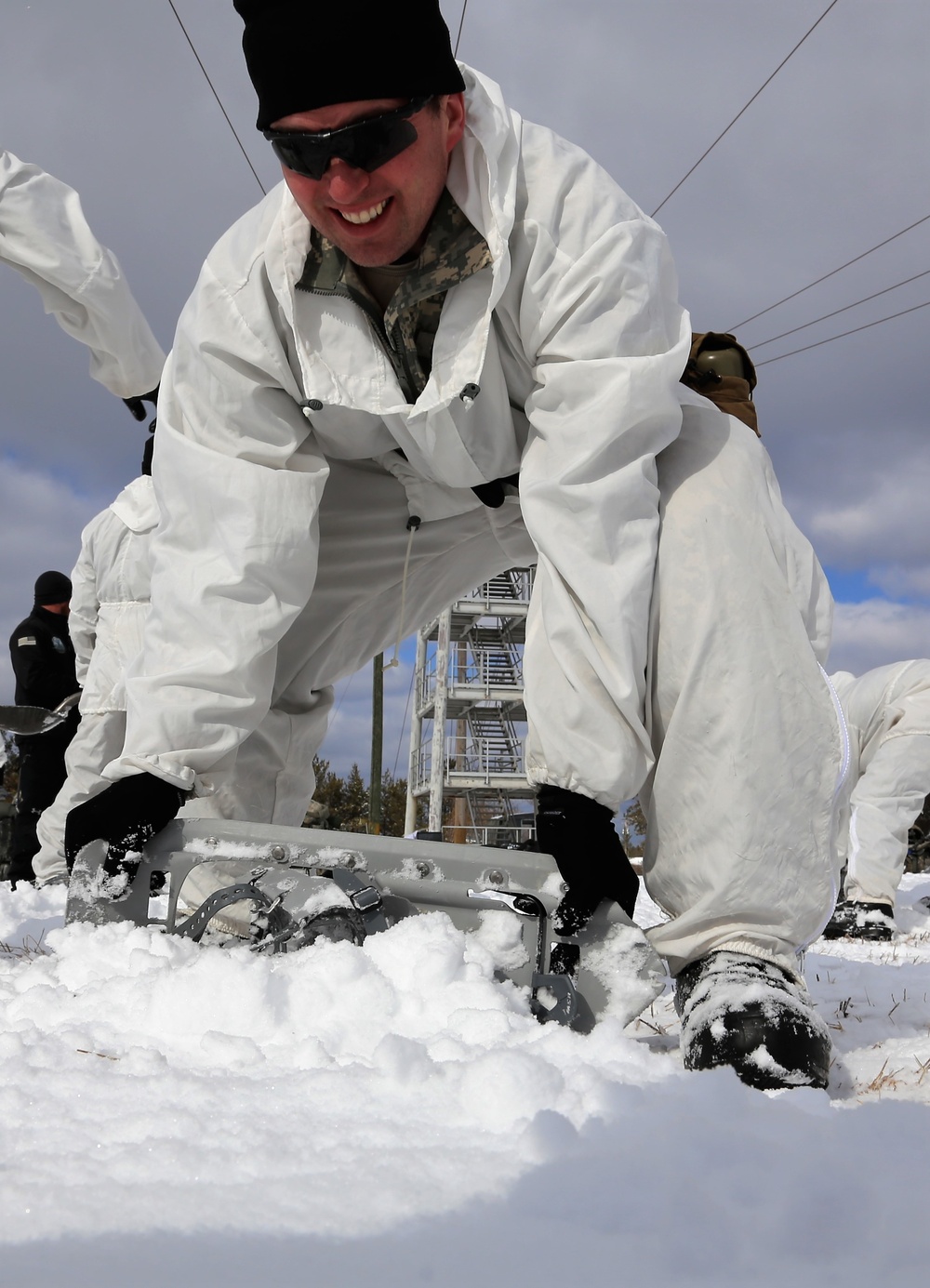 Cold-Weather Operations Course Class 18-06 students build Arctic tents during training at Fort McCoy