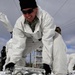 Cold-Weather Operations Course Class 18-06 students build Arctic tents during training at Fort McCoy