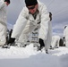 Cold-Weather Operations Course Class 18-06 students build Arctic tents during training at Fort McCoy