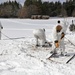 Cold-Weather Operations Course Class 18-06 students build Arctic tents during training at Fort McCoy