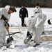 Cold-Weather Operations Course Class 18-06 students build Arctic tents during training at Fort McCoy