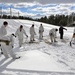 Cold-Weather Operations Course Class 18-06 students build Arctic tents during training at Fort McCoy