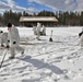 Cold-Weather Operations Course Class 18-06 students build Arctic tents during training at Fort McCoy