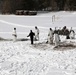 Cold-Weather Operations Course Class 18-06 students build Arctic tents during training at Fort McCoy