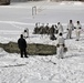 Cold-Weather Operations Course Class 18-04 students build Arctic tents during training at Fort McCoy