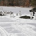 Cold-Weather Operations Course Class 18-04 students build Arctic tents during training at Fort McCoy