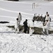 Cold-Weather Operations Course Class 18-04 students build Arctic tents during training at Fort McCoy