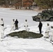 Cold-Weather Operations Course Class 18-04 students build Arctic tents during training at Fort McCoy