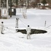 Cold-Weather Operations Course Class 18-06 students build Arctic tents during training at Fort McCoy