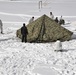 Cold-Weather Operations Course Class 18-06 students build Arctic tents during training at Fort McCoy