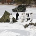 Cold-Weather Operations Course Class 18-06 students build Arctic tents during training at Fort McCoy