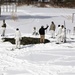 Cold-Weather Operations Course Class 18-06 students build Arctic tents during training at Fort McCoy
