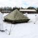 Cold-Weather Operations Course Class 18-06 students build Arctic tents during training at Fort McCoy