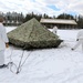 Cold-Weather Operations Course Class 18-06 students build Arctic tents during training at Fort McCoy