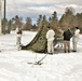 Cold-Weather Operations Course Class 18-06 students build Arctic tents during training at Fort McCoy