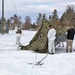 Cold-Weather Operations Course Class 18-06 students build Arctic tents during training at Fort McCoy