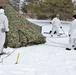 Cold-Weather Operations Course Class 18-06 students build Arctic tents during training at Fort McCoy