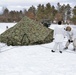 Cold-Weather Operations Course Class 18-06 students build Arctic tents during training at Fort McCoy