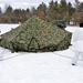 Cold-Weather Operations Course Class 18-06 students build Arctic tents during training at Fort McCoy