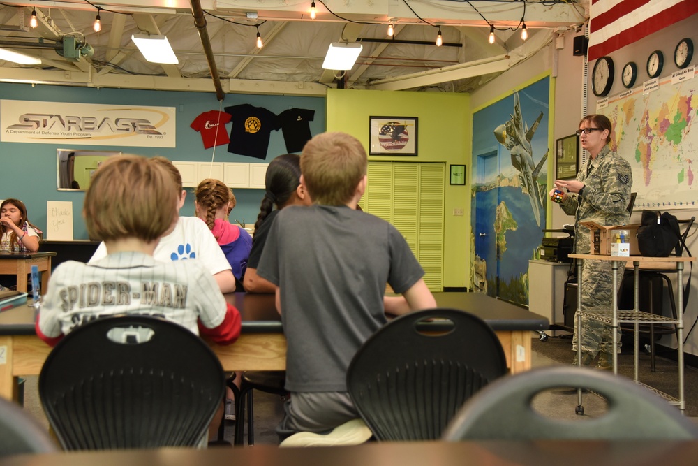 Airman Uses Rubik's Cube to Highlight STEM education for Starbase Students