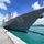 USS Mustin sits moored at Naval Base Guam after MultiSail 18