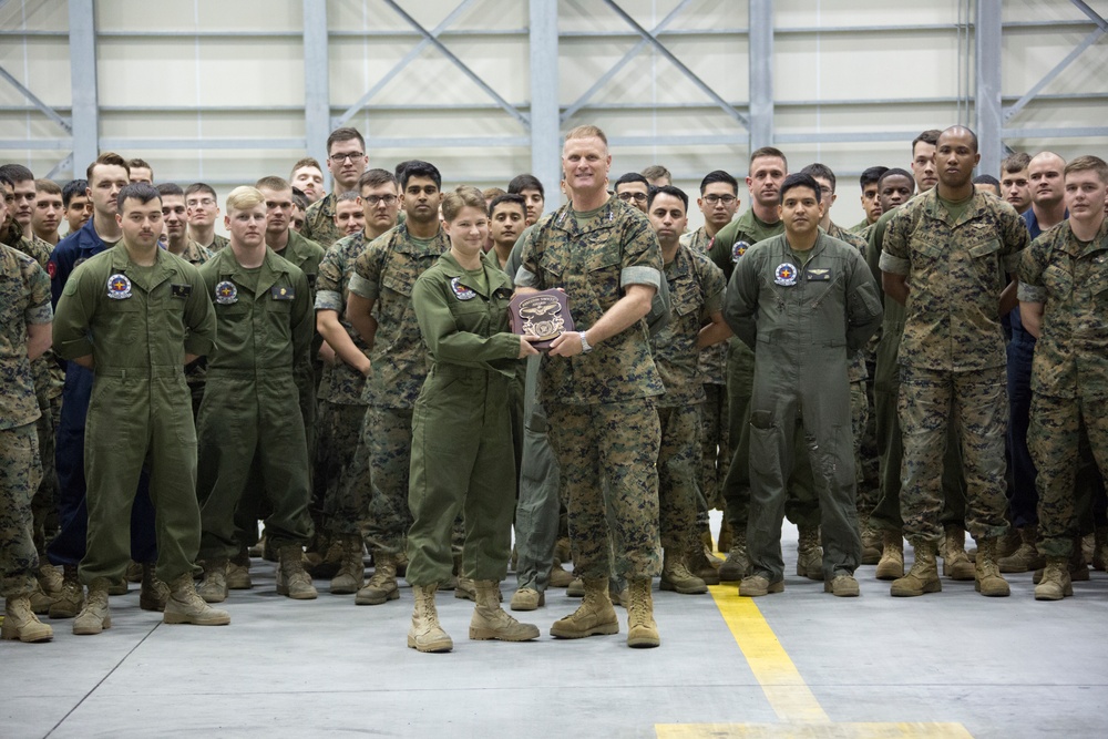 Lt. Gen. Steven R. Rudder presents VMGR-152 with the Chief of Naval Operations (CNO) Safety Award