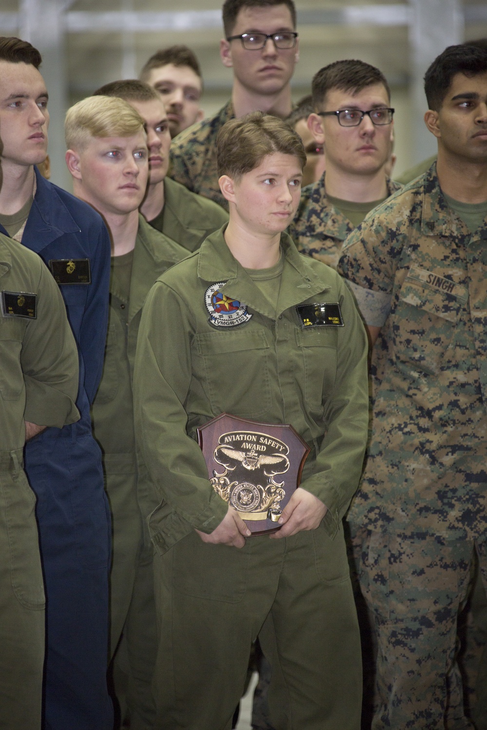 Lt. Gen. Steven R. Rudder presents VMGR-152 with the Chief of Naval Operations (CNO) Safety Award