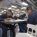 USS Bonhomme Richard (LHD 6) Sailors take the Navywide E-4 Advancement Exam