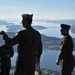 Lt. Cmdr. Justin Jennings reenlists AWO2 Fouche on Mt. Erie