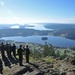 Lt. Cmdr. Justin Jennings reenlists AWO2 Fouche on Mt. Erie