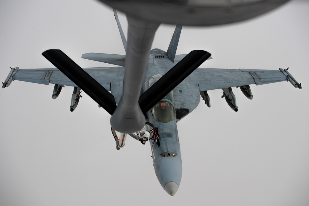 KC-135 refuels Navy Super Hornets and Growlers