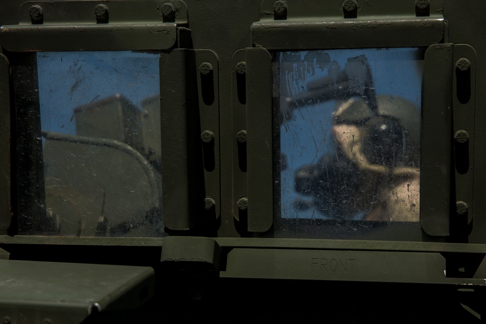 U.S. Marines of 2nd LAR perform gunnery in full MOPP