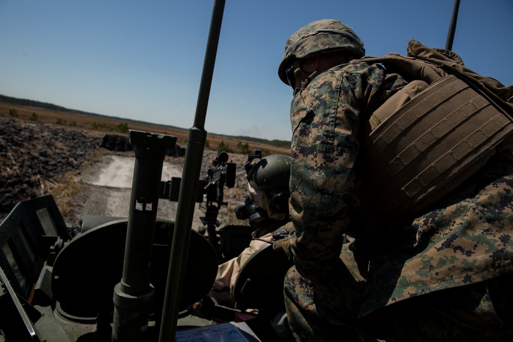 U.S. Marines of 2nd LAR perform gunnery in full MOPP