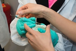 Shaw dental students brush away bad habits