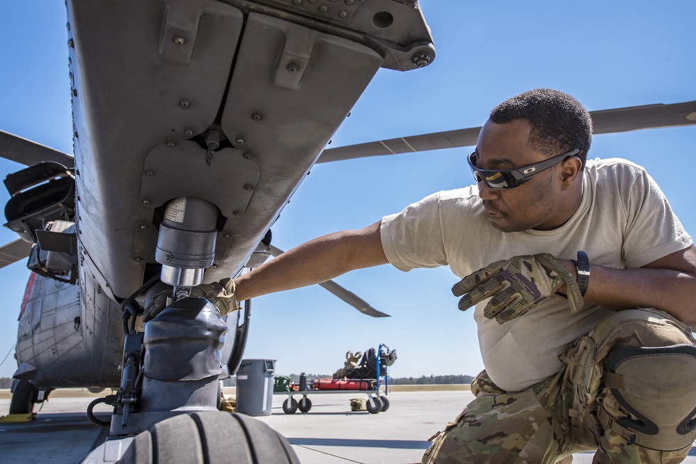 Airmen prep HH-60G fpr training