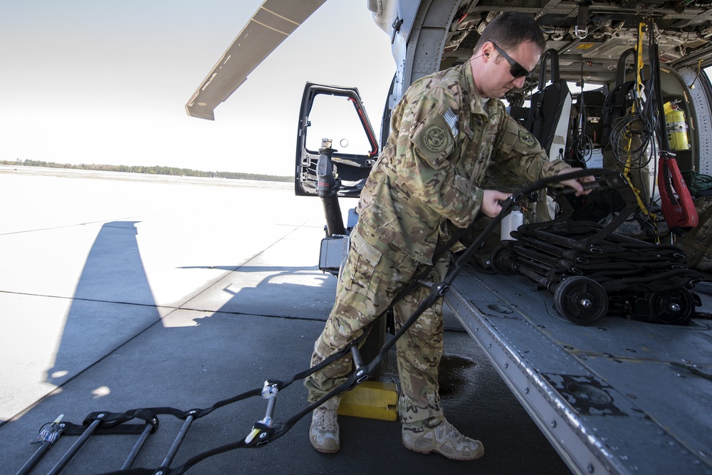 Airmen prep HH-60G for training