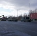 A Letterkenny Munitions Center employees unload shipping containers from the 1048th Transportation Company, Connecticut Army National Guard’s flatbed trailers in support of Operation Patriot Bandoleer.