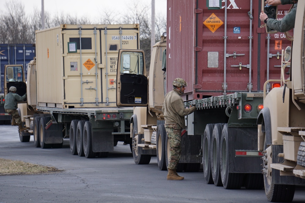 A 432nd Transportation Company, U.S. Army Reserve - Puerto Rico Soldier prepares for Letterkenny Munitions Center to unload the shipping container from his flatbed in support of Operation Patriot Bandoleer.