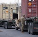 A 432nd Transportation Company, U.S. Army Reserve - Puerto Rico Soldier prepares for Letterkenny Munitions Center to unload the shipping container from his flatbed in support of Operation Patriot Bandoleer.