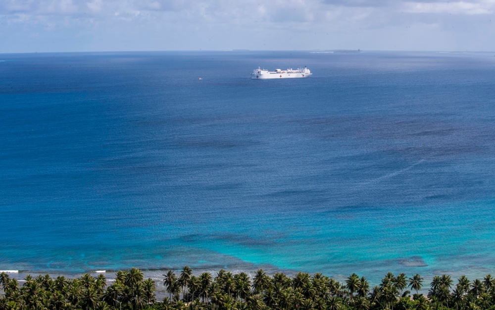 USNS Mercy Transits in waters near the Ulithi Atoll