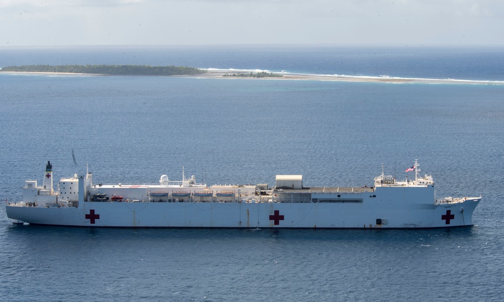 USNS Mercy Transits waters near the Ulithi Atoll