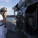 Sailors aboard USNS Mercy transfer medical supplies to Ulithi