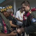 Sailors aboard USNS Mercy transfer medical supplies to Ulithi
