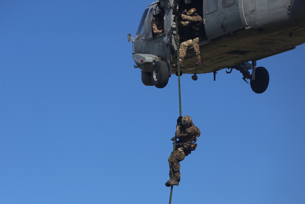 U.S. Marines with 3rd Reconnaissance Battalion conduct special insertion training with British Royal Marines, U.S. Sailors