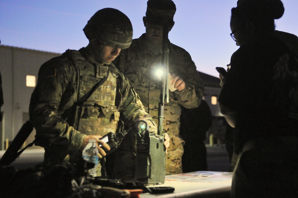 Soldier prepares radio during Soldier of the Quarter competition