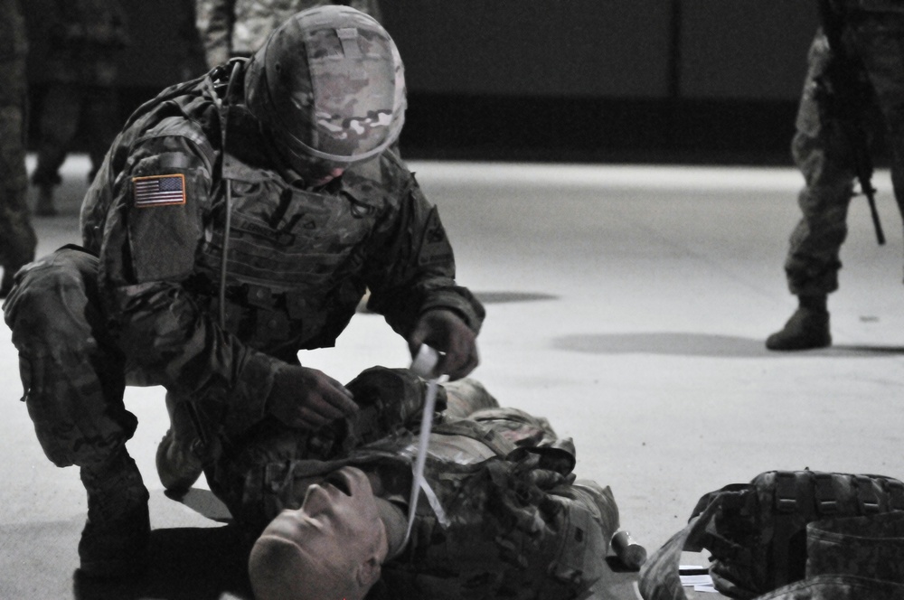 Soldier performs first aid during competition