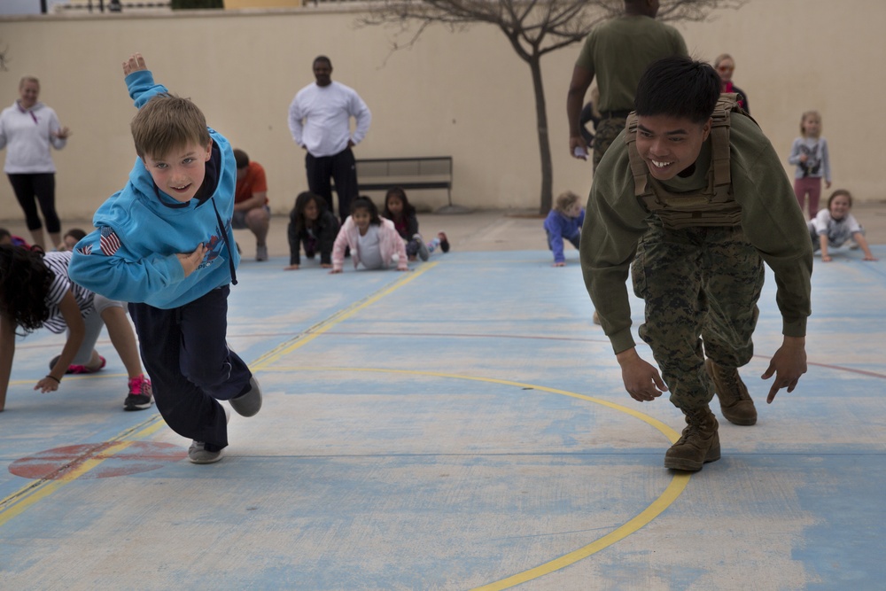 U.S. Marines with SPMAGTF-CR-AF LCE 18.2 help Sigonella Elementary School children ‘overcome obstacles’